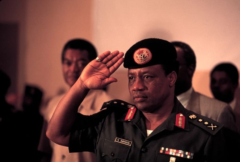 General Ibrahim Babangida, the Nigerian MIlitary Head of State pictured saluting at a function in 1989.